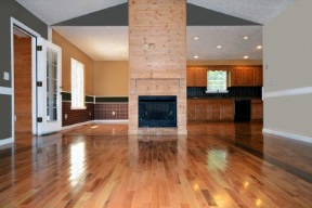 open concept home with refinished hardwood floors